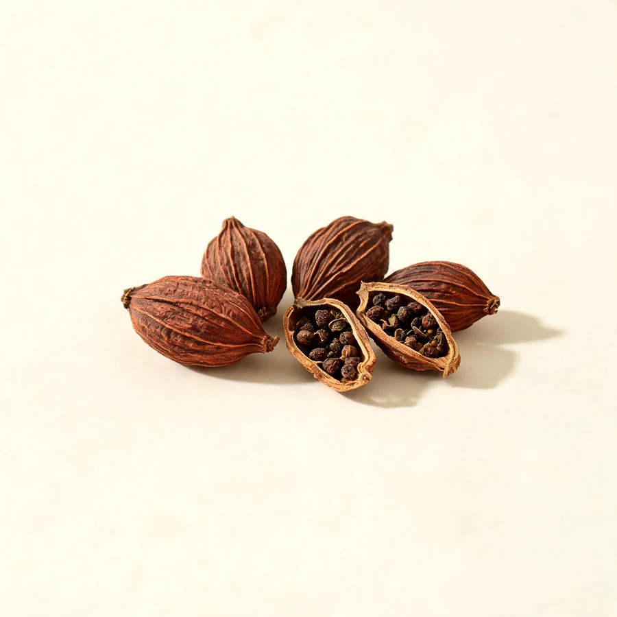Dried Cao Guo fruit arranged in a shallow bowl