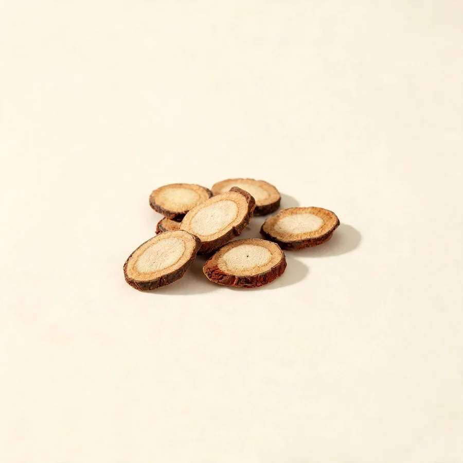 Dried Chi Shao root arranged in a shallow bowl