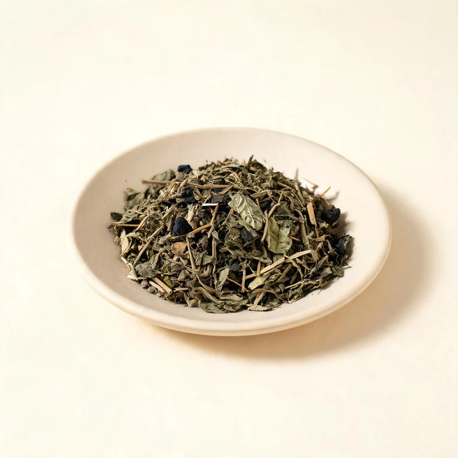 Dried Mo Han Lian aerial parts arranged in a shallow bowl