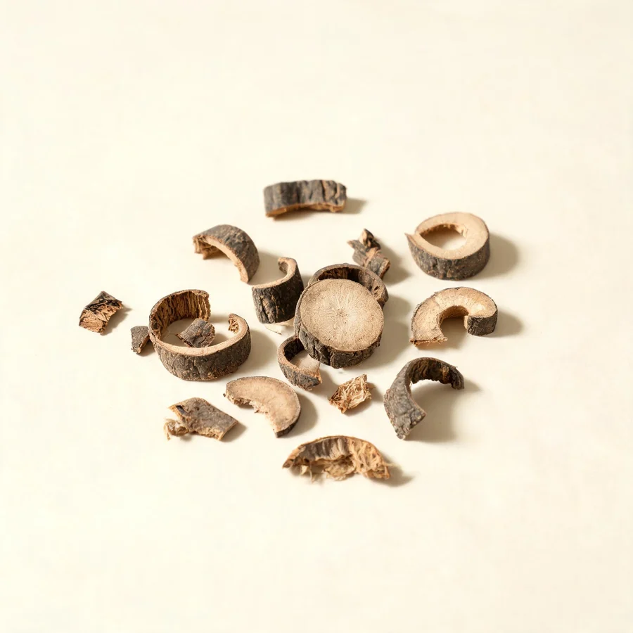 Dried Mu Dan Pi root bark arranged in a shallow bowl